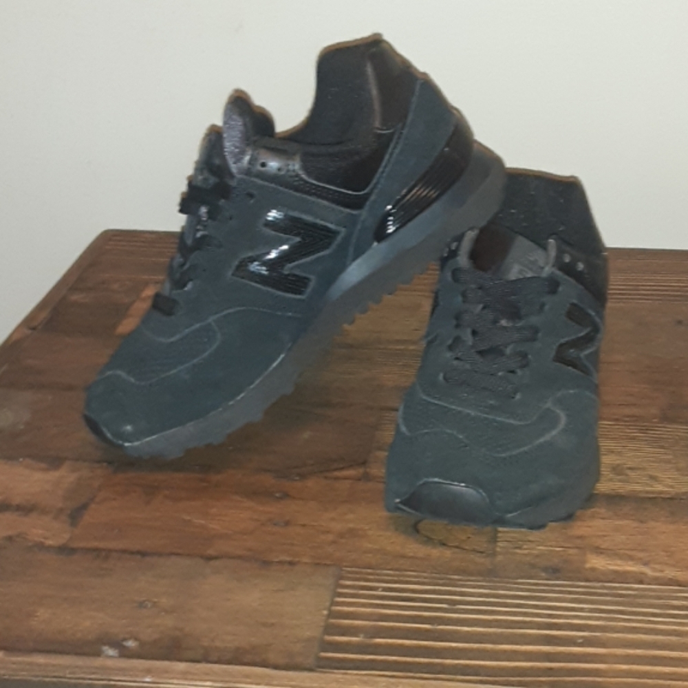 Womens new balance Numeric 574 size 7.